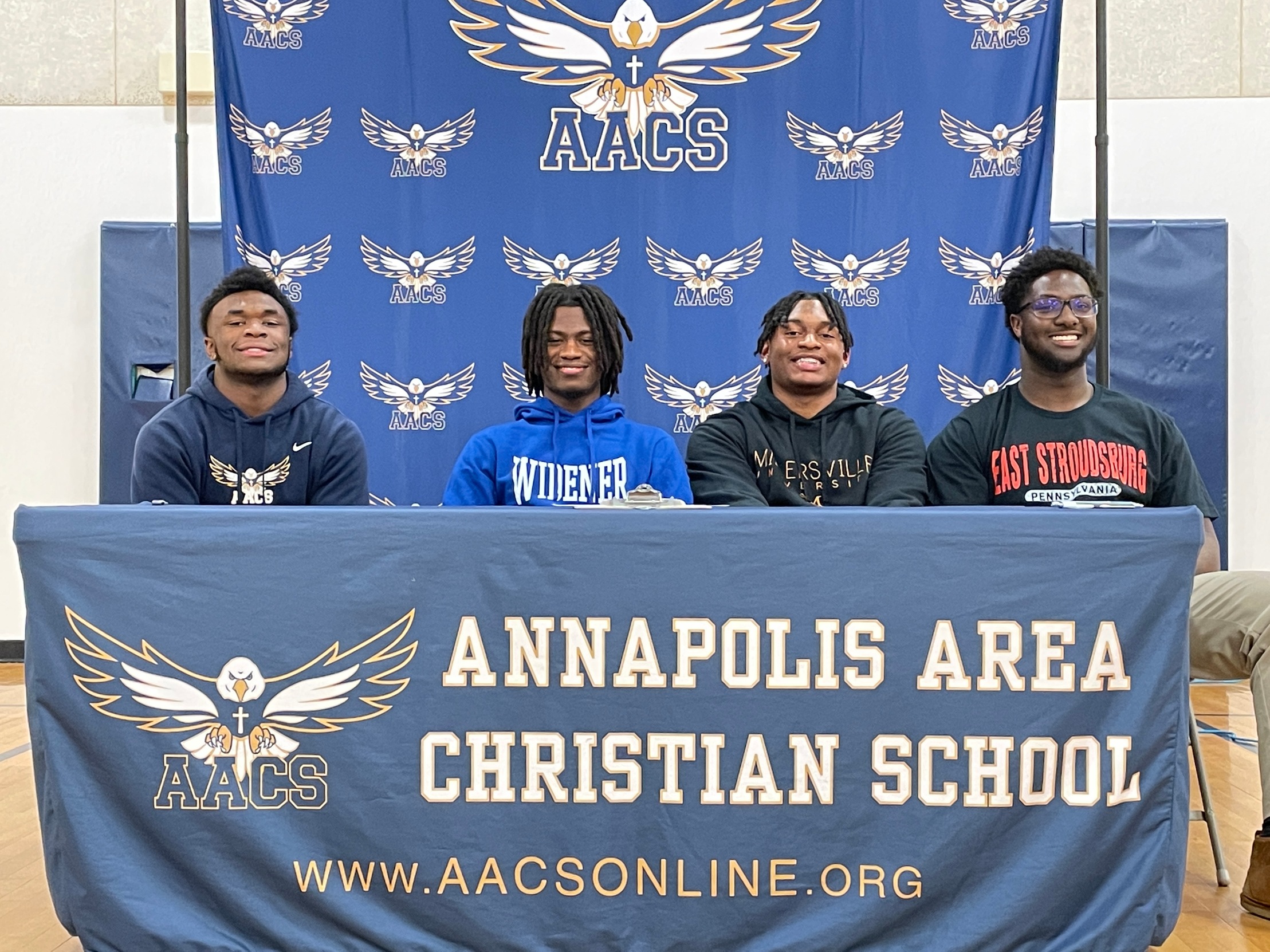 Four Football Players Sign To Play In College