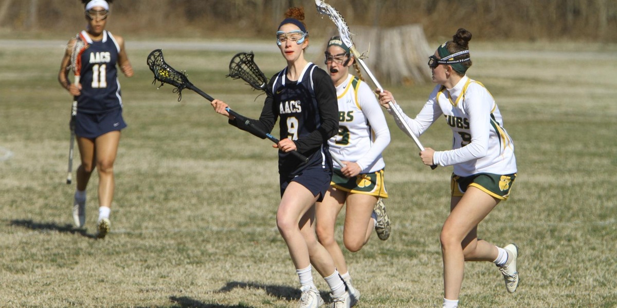 AACS Stays In 1st With Win Over Friends